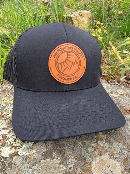 Mountleisure - Sun Mountain Threads Leather Patch Trucker Hat CO 8465 Black/ Black